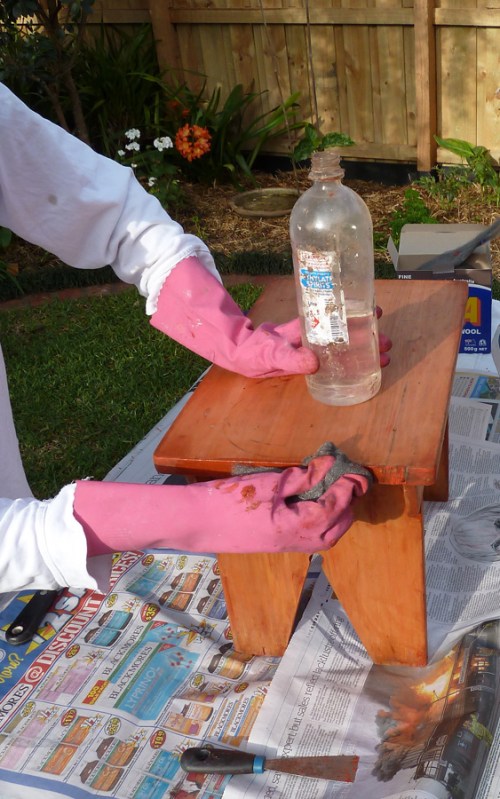 cleaning off the stripper using metho and steelwool