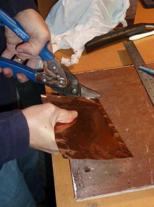 cutting the metal plate